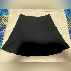 Express Black short pleated flare skirt size 12 new Without tags